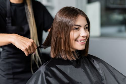 Salon cape prepared for professional laundry service